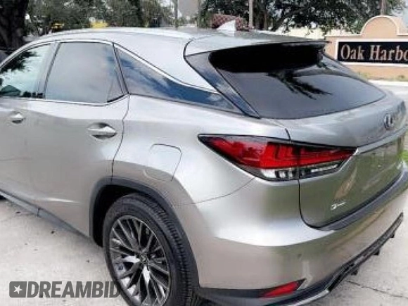 2022 Lexus RX with VIN 2T2YGMDA4NC072921, listed as a Copart auction lot 73366674 with 13,262 mi miles and Clean Title. Bid and sale history available at carsss.com. Image 3.