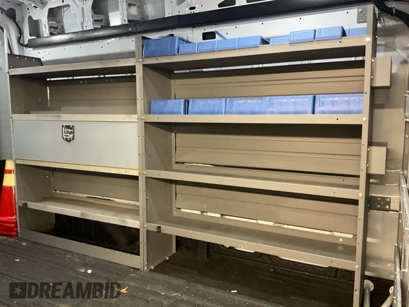 2023 Ford Transit Cargo z VIN 1FTBR1X85PKA75596, wystawiony jako IAAI lot #42742859 z przebiegiem 45 875 mil mil oraz . Historia ofert i sprzedaży dostępna na DreamBid. Obrazek 4.
