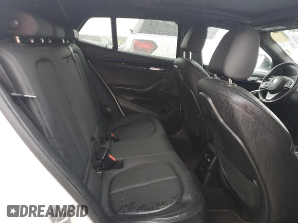 2022 BMW X2 xDrive28i z VIN WBXYJ1C00N5U17584, wystawiony jako Copart lot #55994955 z przebiegiem 21 973 mil mil oraz Czysty tytuł • Clean title. Historia ofert i sprzedaży dostępna na DreamBid. Obrazek 10.