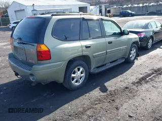 2004 GMC Envoy SLE with VIN 1GKDT13S942254932, listed as a IAAI auction lot 41509407 with 213,068 mi miles. Bid and sale history available at carsss.com. Image 4.