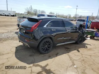 2021 Cadillac XT4 AWD Premium Luxury z VIN 1GYFZDR48MF081095, wystawiony jako Copart lot #54206265 z przebiegiem 60 923 mil mil oraz Tytuł czysty. Historia ofert i sprzedaży dostępna na DreamBid. Obrazek 3.