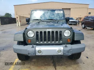 2008 Jeep Wrangler Unlimited Sahara with VIN 1J4GB59108L653823, listed as a Copart auction lot 56324635 with 170,831 mi miles and Clean title. Bid and sale history available at DreamBid. Image 5.