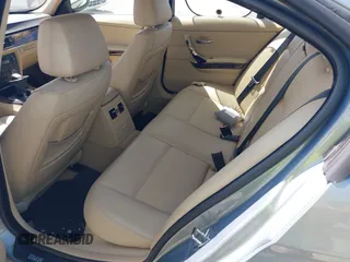 2008 BMW 3 Series 328i with VIN WBAVA37598NL45688, listed as a IAAI auction lot 41962680 with 203,776 mi miles. Bid and sale history available at carsss.com. Image 8.