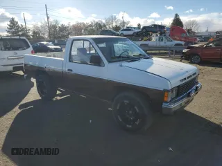 1987 Nissan Hardbody E z VIN JN6ND11S4HW011430, wystawiony jako Copart lot #81785214 z przebiegiem 334 566 mil mil oraz Tytuł czysty. Historia ofert i sprzedaży dostępna na DreamBid. Obrazek 4.