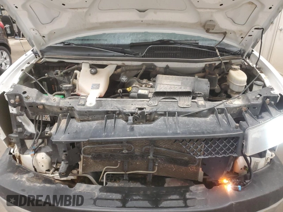 2014 Chevrolet Express Passenger LT with VIN 1GAZG1FG4E1176590, listed as a Copart auction lot 83660024 with 167,653 mi miles and Salvage title. Bid and sale history available at DreamBid. Image 13.
