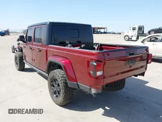 2021 Jeep Gladiator Willys z VIN 1C6HJTAG0ML536455, wystawiony jako IAAI lot #41702393 z przebiegiem 90 644 mil mil oraz . Historia ofert i sprzedaży dostępna na DreamBid. Obrazek 3.
