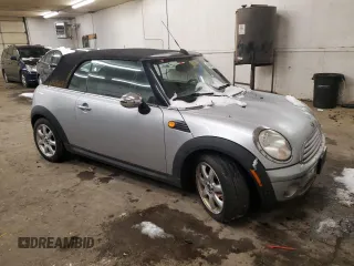 2010 MINI Convertible with VIN WMWMR3C55ATU98337, listed as a Copart auction lot 45039425 with Not Provided miles and Clean Title. Bid and sale history available at DreamBid. Image 4.