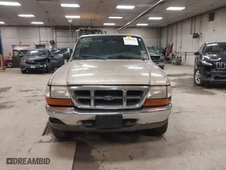 1999 Ford Ranger XLT with VIN 1FTYR11X0XTA72917, listed as a IAAI auction lot 41502156 with 106,585 mi miles. Bid and sale history available at carsss.com. Image 13.