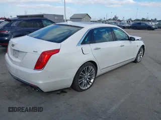 2016 Cadillac CT6 Luxury AWD with VIN 1G6KD5RSXGU154557, listed as a IAAI auction lot 41550199 with 102,536 mi miles and . Bid and sale history available at DreamBid. Image 4.