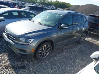 2021 Volkswagen Tiguan S with VIN 3VV1B7AX7MM038431, listed as a IAAI auction lot 42726529 with 82,289 mi miles and . Bid and sale history available at DreamBid. Image 2.