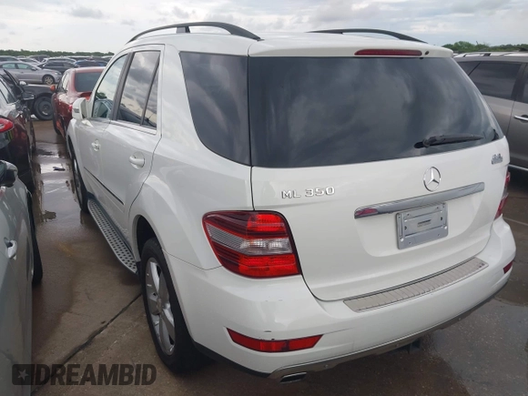 2011 Mercedes-Benz M 350 with VIN 4JGBB5GB5BA627082, listed as a IAAI auction lot 42036823 with 164,098 mi miles and . Bid and sale history available at DreamBid. Image 3.