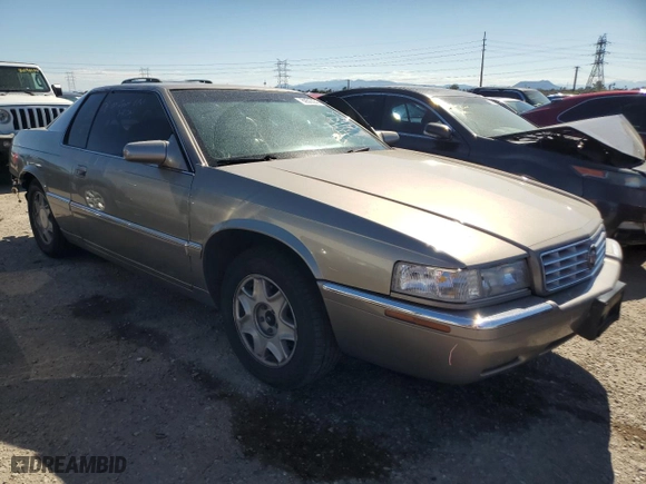 2000 Cadillac Eldorado with VIN 1G6EL12Y7YU135375, listed as a Copart auction lot 69503944 with 105,703 mi miles and Salvage Title. Bid and sale history available at carsss.com. Image 4.