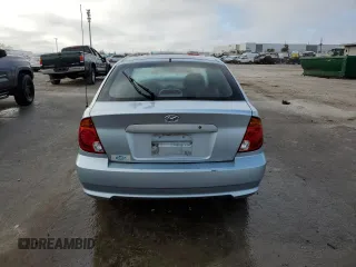 2004 Hyundai Accent GL with VIN KMHCG35CX4U293817, listed as a Copart auction lot 86087074 with 0 mi miles and Salvage Title. Bid and sale history available at carsss.com. Image 6.