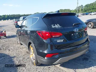 2017 Hyundai Santa Fe 2.4L z VIN 5NMZU3LB8HH031180, wystawiony jako IAAI lot #42242405 z przebiegiem 139 739 mil mil oraz . Historia ofert i sprzedaży dostępna na DreamBid. Obrazek 3.