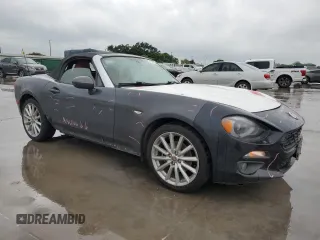 2017 FIAT 124 Spider Lusso z VIN JC1NFAEK8H0104765, wystawiony jako Copart lot #52759754 z przebiegiem 82 970 mil mil oraz Szkody całkowita. Historia ofert i sprzedaży dostępna na DreamBid. Obrazek 4.