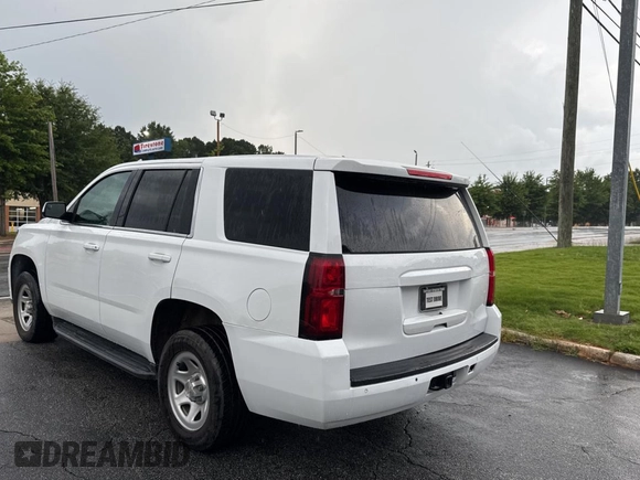 2019 Chevrolet Tahoe Commercial with VIN 1GNLCDECXKR281986, listed as a Copart auction lot 63148895 with 103,693 mi miles and Clean title. Bid and sale history available at DreamBid. Image 3.
