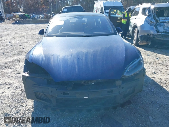 2016 Tesla Model S 90D with VIN 5YJSA1E25GF144614, listed as a IAAI auction lot 40941311 with 83,587 mi miles and . Bid and sale history available at DreamBid. Image 6.