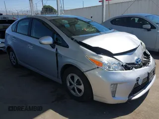 2015 Toyota Prius Four z VIN JTDKN3DU9F1958534, wystawiony jako IAAI lot #42323504 z przebiegiem 88 200 mil mil oraz . Historia ofert i sprzedaży dostępna na DreamBid. Obrazek 1.