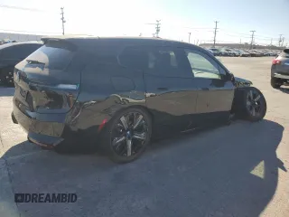 2024 BMW iX M60 with VIN WB533CF01RCR28341, listed as a Copart auction lot 69646904 with 1,753 mi miles and Salvage Title. Bid and sale history available at carsss.com. Image 3.