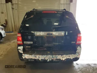 2010 Ford Escape Limited with VIN 1FMCU9EG3AKC87458, listed as a Copart auction lot 59057165 with 110,611 mi miles and Non repairable. Bid and sale history available at DreamBid. Image 6.