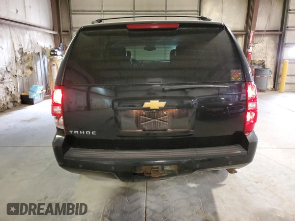 2013 Chevrolet Tahoe LT with VIN 1GNSKBE01DR288157, listed as a Copart auction lot 52665075 with 152,068 mi miles and Salvage Title. Bid and sale history available at DreamBid. Image 6.