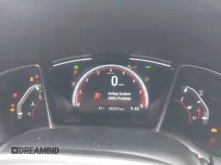 2021 Honda Civic Sport with VIN 2HGFC2F87MH554620, listed as a IAAI auction lot 41743596 with 52,327 mi miles and . Bid and sale history available at DreamBid. Image 15.