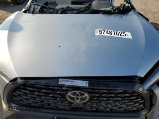2023 Toyota Corolla Cross L z VIN 7MUAAAAG0PV064006, wystawiony jako Copart lot #57481625 z przebiegiem Nie podano mil oraz Nie do naprawy • Non repairable. Historia ofert i sprzedaży dostępna na DreamBid. Obrazek 12.