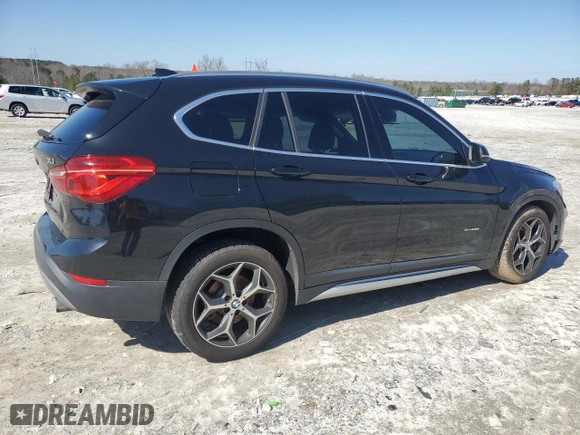 2016 BMW X1 xDrive28i with VIN WBXHT3C32GP884206, listed as a Copart auction lot 48767695 with 112,864 mi miles and Salvage Title. Bid and sale history available at carsss.com. Image 3.