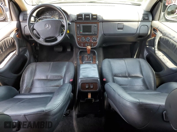 2000 Mercedes-Benz M 320/430/500 with VIN 4JGAB72EXYA193906, listed as a Copart auction lot 62025125 with 142,808 mi miles and Salvage title. Bid and sale history available at DreamBid. Image 8.