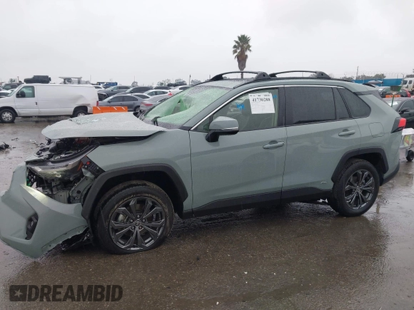 2023 Toyota RAV4 Hybrid XLE Premium with VIN JTMB6RFVXPD104349, listed as a IAAI auction lot 41730288 with 30,904 mi miles. Bid and sale history available at carsss.com. Image 14.