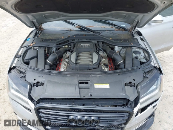 2011 Audi A8 z VIN WAUAVAFD7BN006743, wystawiony jako IAAI lot #42278486 z przebiegiem Nie podano mil oraz . Historia ofert i sprzedaży dostępna na DreamBid. Obrazek 10.