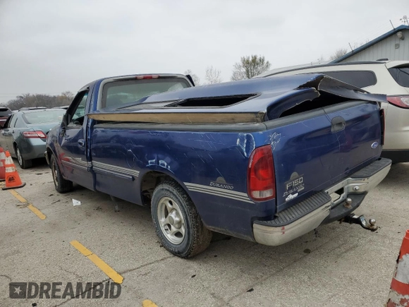 1997 Ford F-150 with VIN 1FTDF1724VKC02428, listed as a Copart auction lot 82011644 with 111,520 mi miles and Salvage title. Bid and sale history available at DreamBid. Image 2.