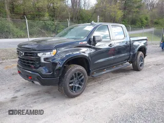 2023 Chevrolet Silverado 1500 LT Trail Boss with VIN 3GCUDFE89PG270678, listed as a IAAI auction lot 42028188 with 46,820 mi miles and . Bid and sale history available at DreamBid. Image 2.