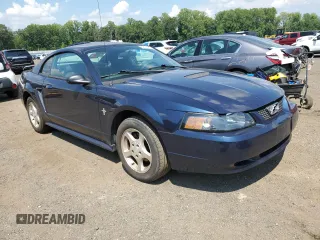 2002 Ford Mustang Standard with VIN 1FAFP40442F202944, listed as a Copart auction lot 62178415 with 124,619 mi miles and Salvage title. Bid and sale history available at DreamBid. Image 4.