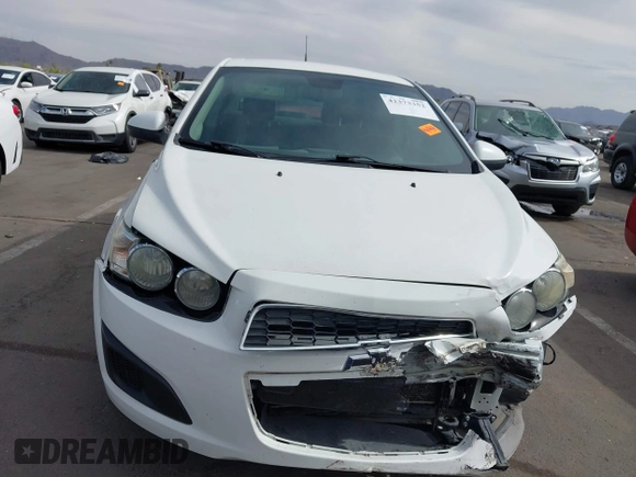 2013 Chevrolet Sonic LS with VIN 1G1JA5SH9D4249356, listed as a IAAI auction lot 42373352 with 151,337 mi miles and . Bid and sale history available at DreamBid. Image 13.