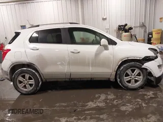 2015 Chevrolet Trax LT with VIN 3GNCJRSB7FL203418, listed as a IAAI auction lot 41572289 with 148,402 mi miles and . Bid and sale history available at DreamBid. Image 13.