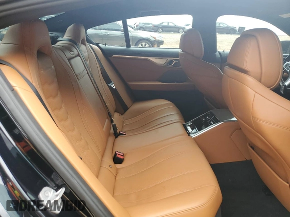 2021 BMW 8 Series M850i z VIN WBAGV8C06MCG35500, wystawiony jako Copart lot #59467425 z przebiegiem 54 268 mil mil oraz Szkoda całkowita • Salvage title. Historia ofert i sprzedaży dostępna na DreamBid. Obrazek 10.