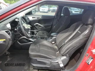 2013 Hyundai Veloster w/Black Int z VIN KMHTC6AD5DU173242, wystawiony jako Copart lot #54733125 z przebiegiem 157 766 mil mil oraz Czysty tytuł • Clean title. Historia ofert i sprzedaży dostępna na DreamBid. Obrazek 7.