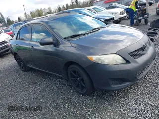 2010 Toyota Corolla with VIN 1NXBU4EEXAZ169411, listed as a IAAI auction lot 42012683 with 178,545 mi miles. Bid and sale history available at carsss.com. Image 1.