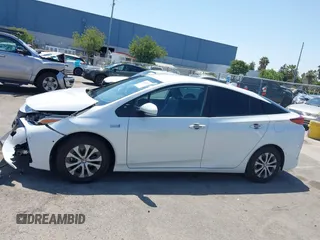 2021 Toyota Prius LE z VIN JTDKAMFP3M3187644, wystawiony jako IAAI lot #42443171 z przebiegiem 126 977 mil mil oraz . Historia ofert i sprzedaży dostępna na DreamBid. Obrazek 13.