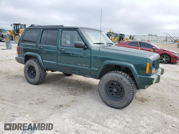 2001 Jeep Cherokee Sport with VIN 1J4FF58SX1L615967, listed as a Copart auction lot 43709235 with 241,326 mi miles and Clean title. Bid and sale history available at DreamBid. Image 4.