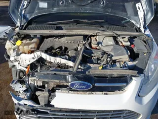 2016 Ford C-Max Energi SEL with VIN 1FADP5CU2GL118381, listed as a IAAI auction lot 41516426 with 220,361 mi miles. Bid and sale history available at carsss.com. Image 10.