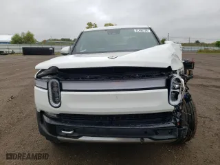 2022 Rivian R1T Adventure Package with VIN 7FCTGAAA8NN012505, listed as a Copart auction lot 72496734 with 5,916 mi miles and Salvage Title. Bid and sale history available at carsss.com. Image 5.
