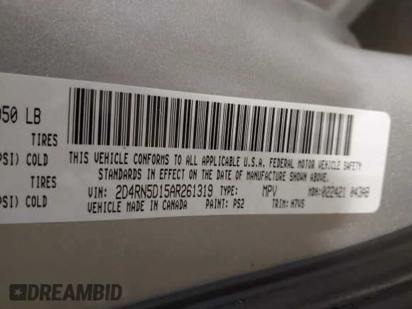 2010 Dodge Grand Caravan SXT with VIN 2D4RN5D15AR261319, listed as a IAAI auction lot 41877022 with 142,292 mi miles and . Bid and sale history available at DreamBid. Image 9.