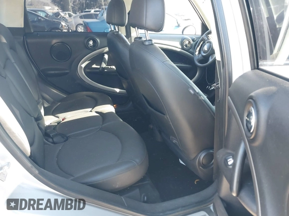 2013 MINI Countryman with VIN WMWZB3C59DWM09740, listed as a IAAI auction lot 41648192 with 145,915 mi miles and . Bid and sale history available at DreamBid. Image 8.