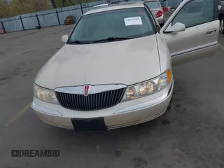 2001 Lincoln Continental with VIN 1LNHM97V51Y602324, listed as a IAAI auction lot 42053789 with 192,221 mi miles. Bid and sale history available at carsss.com. Image 6.