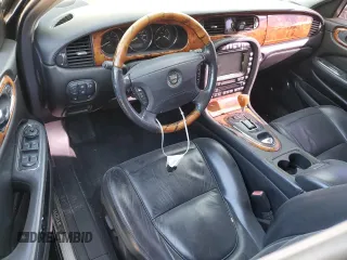 2005 Jaguar XJ VDP with VIN SAJWA82C05SG47513, listed as a Copart auction lot 75428654 with 157,442 mi miles and Salvage Title. Bid and sale history available at carsss.com. Image 8.