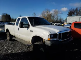 2003 Ford F-350 XL with VIN 1FTSX31P63EB62658, listed as a Copart auction lot 84054284 with 227,705 mi miles and Salvage Title. Bid and sale history available at DreamBid. Image 4.
