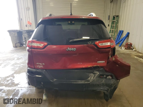2014 Jeep Cherokee Latitude z VIN 1C4PJMCS0EW298425, wystawiony jako Copart lot #52101845 z przebiegiem 156 118 mil mil oraz Nie do naprawy • Non repairable. Historia ofert i sprzedaży dostępna na DreamBid. Obrazek 6.