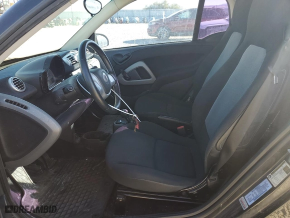2012 Smart fortwo Pure with VIN WMEEJ3BA1CK529414, listed as a Copart auction lot 77463414 with 77,836 mi miles and Clean Title. Bid and sale history available at carsss.com. Image 7.